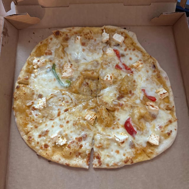 Korma Pizza.